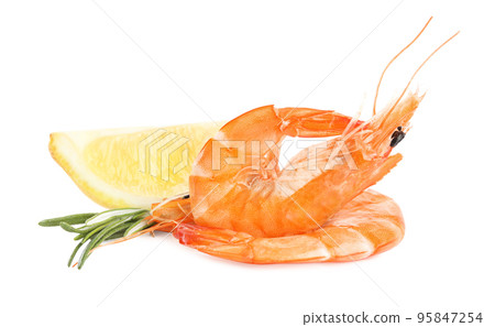Delicious cooked shrimps, lemon and rosemary isolated on white Delicious cooked shrimps, lemon and rosemary isolated on white 95847254