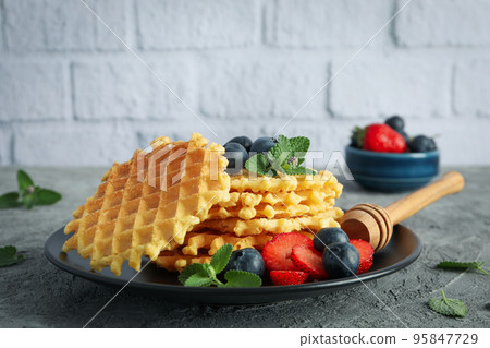 Concept of tasty food with wafers, close up Concept of tasty food with wafers, close up 95847729