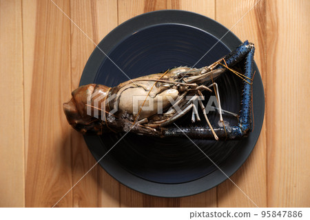 Fresh malaysian freshwater prawn on wooden table, top view 95847886