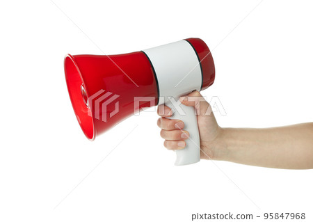 Female hand holds megaphone, isolated on white background Female hand holds megaphone, isolated on white background 95847968