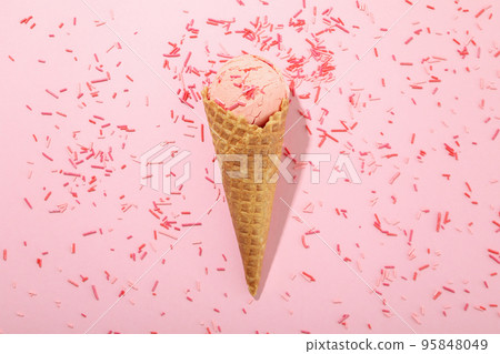 Ice cream and sprinkles on pink background 95848049