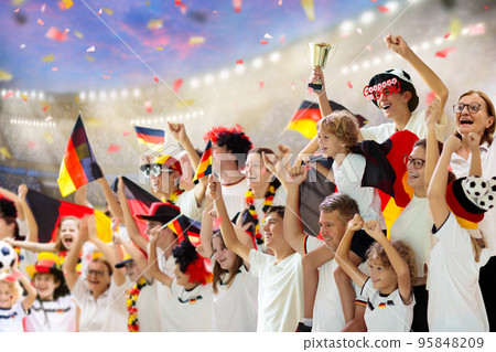 Germany football team supporter on stadium. 95848209