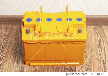 yellow car battery on wood background. yellow car battery on wood background. 95848390