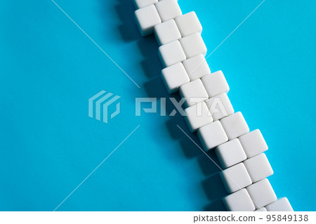 Chain of blocks on a blue background. Abstraction structure. concept of organization and strength. Unity and Consolidation. Orderly system. Stability, steadfastness. Construction and creation 95849138