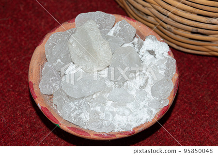 Alum rocks used to fixate colors in textiles, Oaxaca, Mexico 95850048