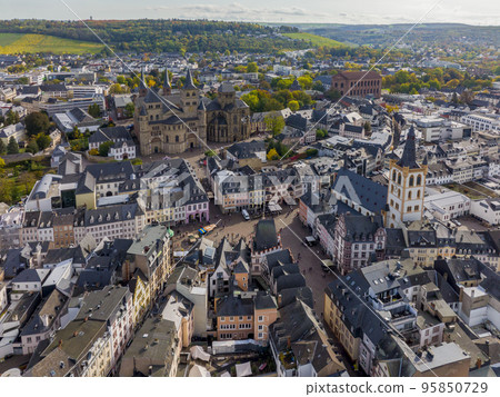 Aerial Drone Shot of the City Center in Trier, Rheinland-Pfalz. Autumn day in Famous German city 95850729