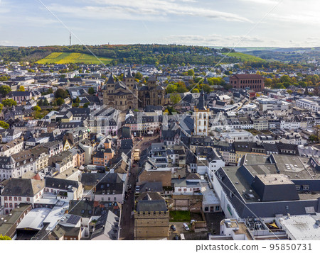 Aerial Drone Shot of the City Center in Trier, Rheinland-Pfalz. Autumn day in Famous German city 95850731