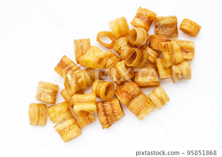 Crispy banana chip rolls. Fruit snack Crispy banana chip rolls. Fruit snack 95851868