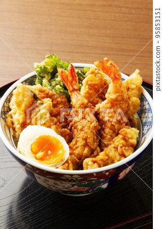 Bowl of rice and fried fish 95853151