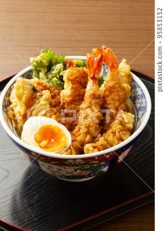 Bowl of rice and fried fish 95853152