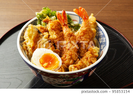 Bowl of rice and fried fish 95853154
