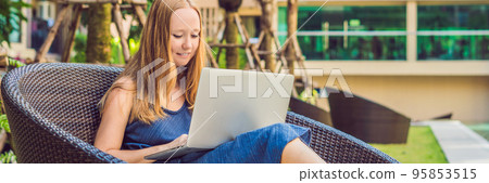 Young female freelancer sitting near the pool with her laptop in the hotel browsing in her smartphone. Busy at holidays. Distant work concept. Copy space for your text BANNER, long format 95853515