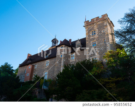 Medieval castle of Dukes of Bourbon on hilltop in Montlucon, France 95855652