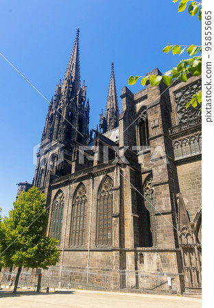 Towering over Clermont-Ferrand city gothic cathedral Notre-Dame-de-l'Assomption, France Towering over Clermont-Ferrand city gothic cathedral Notre-Dame-de-l'Assomption, France 95855665