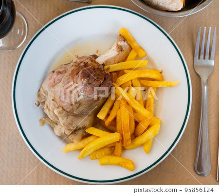 Pork knuckle with french fries Pork knuckle with french fries 95856124