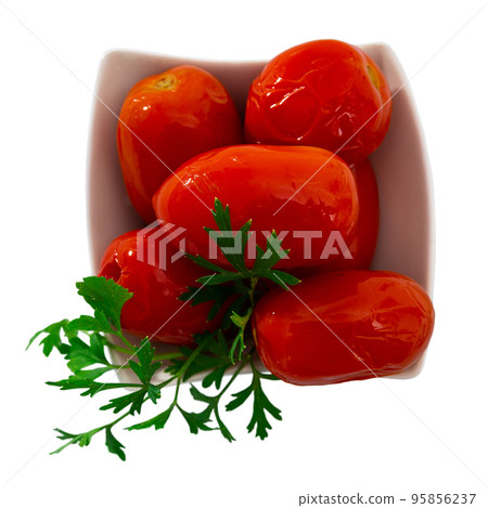 Red pickled tomatoes on plate close up. Preserve, fresh Red pickled tomatoes on plate close up. Preserve, fresh 95856237