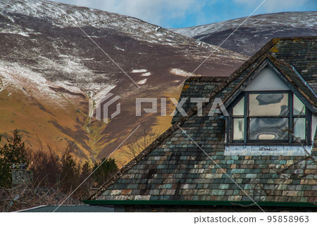 Beautiful mountains Looking through the roof of the house in the Lake District. Beautiful mountains Looking through the roof of the house in the Lake District. 95858963
