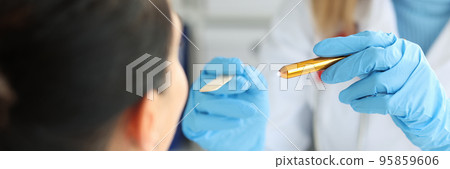 Lady having throat examined with special tool and flashlight, medical support and help in clinic Lady having throat examined with special tool and flashlight, medical support and help in clinic 95859606