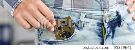 Woman hold credit card in jeans pocket, use card for contactless payment, online transaction Woman hold credit card in jeans pocket, use card for contactless payment, online transaction 95859641