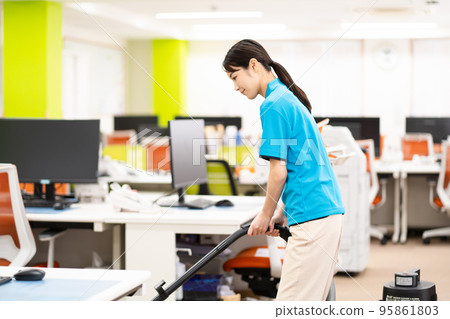 Cleaning staff (young woman, vacuum cleaner) Cleaning staff (young woman, vacuum cleaner) 95861803