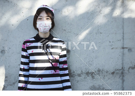 Halloween cosplay image Female prisoner zombie wearing a mask Halloween cosplay image Female prisoner zombie wearing a mask 95862373