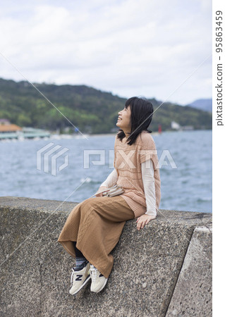Senior woman going out Senior woman going out 95863459