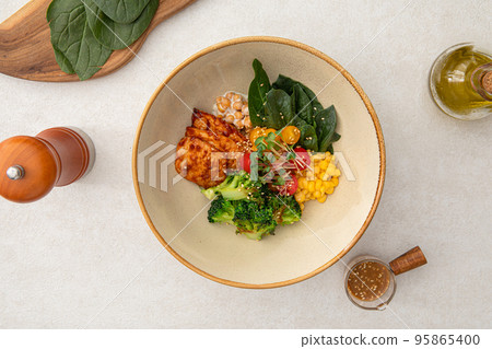 Chicken poke bowl with vegetables and corn Chicken poke bowl with vegetables and corn 95865400