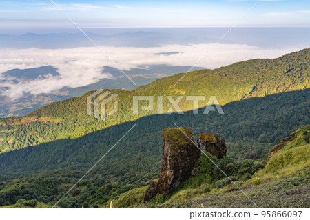 Beautiful landscape view of northern mountain ranges of Thailand seen from the top of Kew Mae Pan Nature Trail Beautiful landscape view of northern mountain ranges of Thailand seen from the top of Kew Mae Pan Nature Trail 95866097