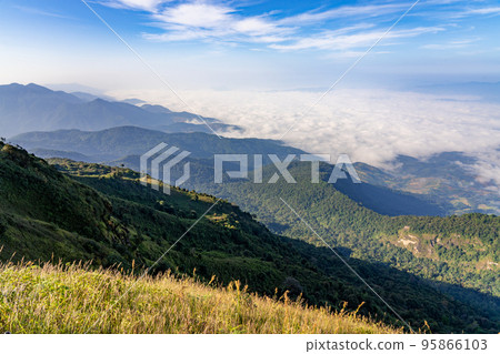 Beautiful landscape view of northern mountain ranges of Thailand seen from the top of Kew Mae Pan Nature Trail Beautiful landscape view of northern mountain ranges of Thailand seen from the top of Kew Mae Pan Nature Trail 95866103