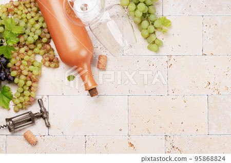 Wine glasses, bottles and grapes Wine glasses, bottles and grapes 95868824