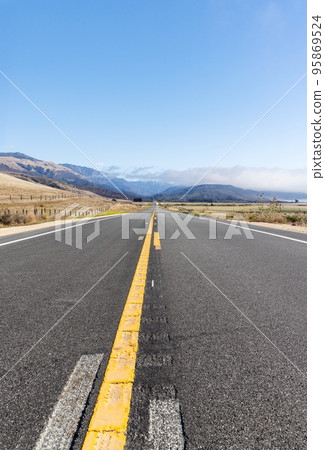 Asphalt road and countryside landscape 95869524