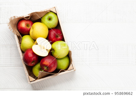 Colorful ripe apple fruits in box Colorful ripe apple fruits in box 95869662