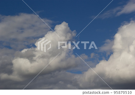 clouds in the sky lit by the sun on a summer day. background clouds in the sky lit by the sun on a summer day. background 95870510