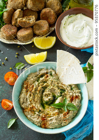 Arabic cuisine. Fresh homemade creamy mung hummus. Ramadan food. Arabic cuisine. Fresh homemade creamy mung hummus. Ramadan food. 95870776