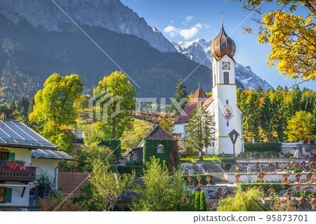 Church St Johannes, Wetterstein, Waxenstein and Zugspitze at sunrise, Grainau 95873701