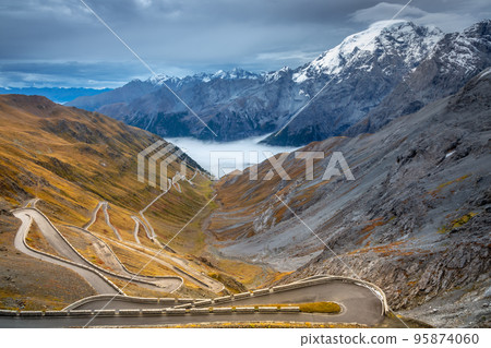 Stelvio mountain pass, impressive dramatic road in italian alps, Italy 95874060