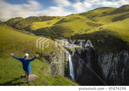 Myself and Waterfall landscape in Southern Brazil at peaceful sunset 95874299