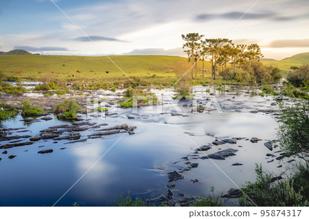 Southern Brazil countryside and river landscape at peaceful sunset 95874317