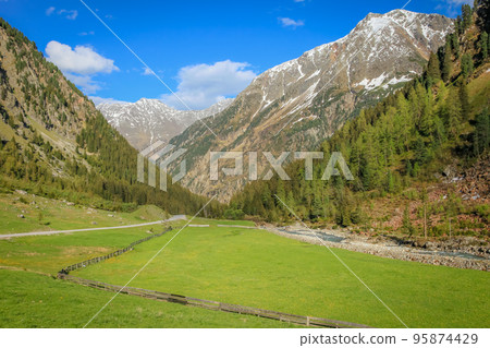 Alpine meadows in Stubai Valley and river, North Tyrol, Austria 95874429