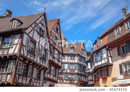 Colmar alsatian architecture at springtime with flowers, Eastern France 95874550