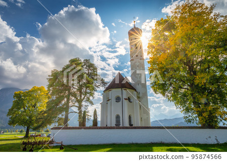 Idyllic St Coloman Church in Allgau, Bavarian Alps at sunny springtime, Germany Idyllic St Coloman Church in Allgau, Bavarian Alps at sunny springtime, Germany 95874566