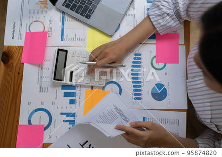 Business Documents, Auditor businesswoman searching document legal prepare paperwork and report for analysis TAX time, accountant Documents data contract partner deal in workplace 95874820