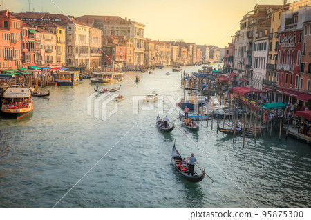Ornate Gondolas in Grand Canal at golden sunset, Venice, Italy 95875300