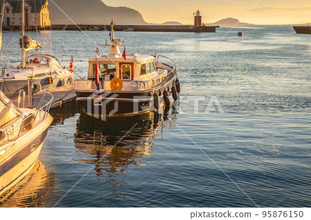 Alesund Sea port with ships at peaceful dawn, Norway, Scandinavia Alesund Sea port with ships at peaceful dawn, Norway, Scandinavia 95876150