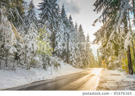 Mountain Road between Bavarian Alps and Austrian Tyrol at autumn, after snow 95876165
