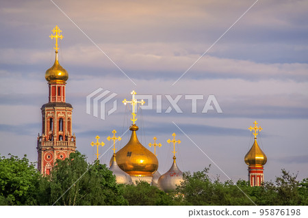 Novodevichy convent golden domes in Moscow, Russia Novodevichy convent golden domes in Moscow, Russia 95876198