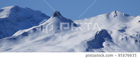 Snow covered mountain landscape seen from Chaeserrugg, Switzerland. 95876635