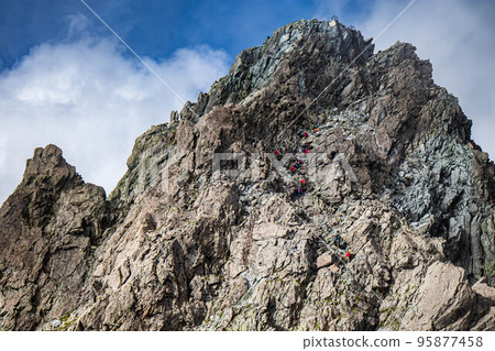 Climbers climbing Mt. Yarigatake Climbers climbing Mt. Yarigatake 95877458
