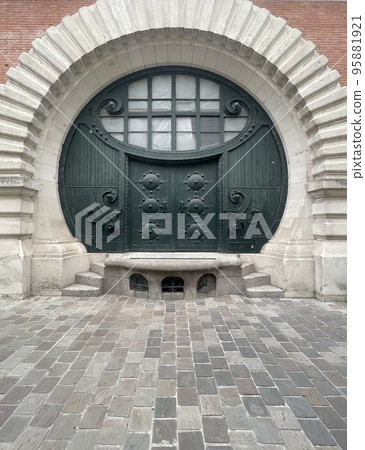 round door from the Middle Ages in a wall round door from the Middle Ages in a wall 95881921