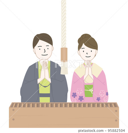 Men and women in kimonos visiting a shrine 95882504